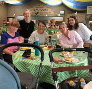 mums with babies in the hen house restaurant at Why is Farmer Palmers Dorset's Favourite Family Day Out!